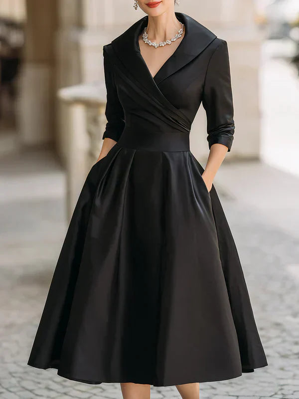 Elegant Midi Dress with Refined Details and Practical Pockets