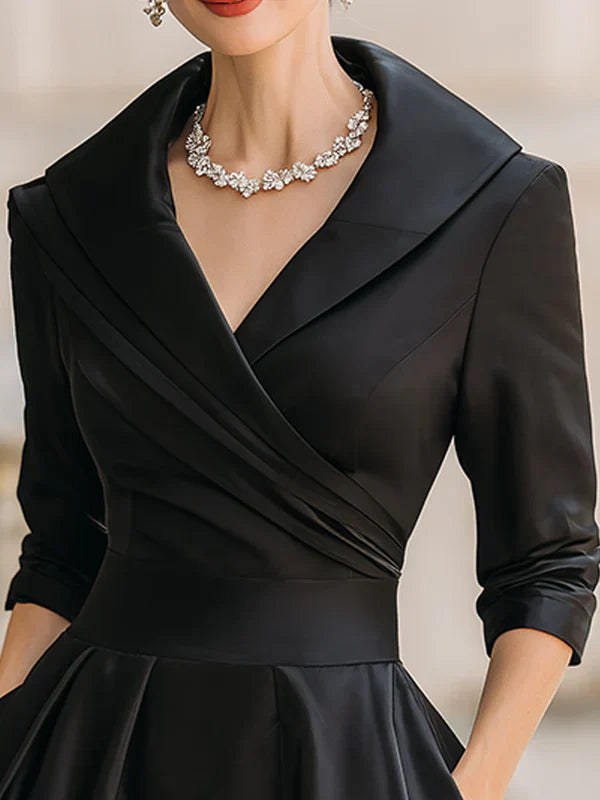 Elegant Midi Dress with Refined Details and Practical Pockets